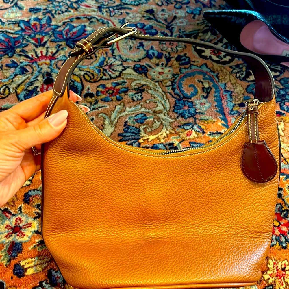 Shoulder bag. Lots of life left. Some wear & tear.
